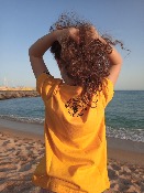 Camiseta Amarillo 100% algodón ecológico niños y niñas con un Pulpo en el mar invitando a respetar el océano